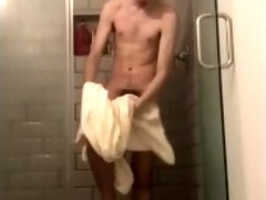 19 year old Jesse Gold swings his cock around and plays with himself in the shower
