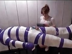 Enduring mummification only his cock is left for teasing BDSM