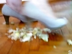 Feet crushing fruit