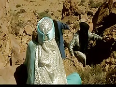 Three Arabs fucks hot Arabian  slut in desert .